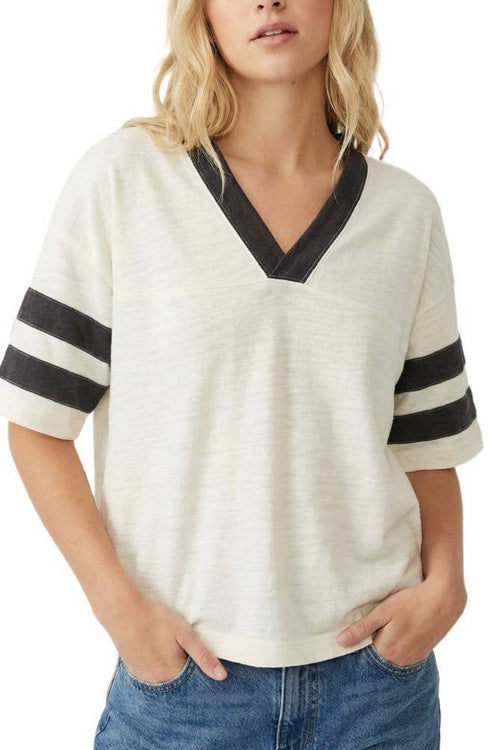 Bombom vintage wash V-neck top with black contrast neckline and double sleeve stripes in a relaxed, slightly oversized fit.