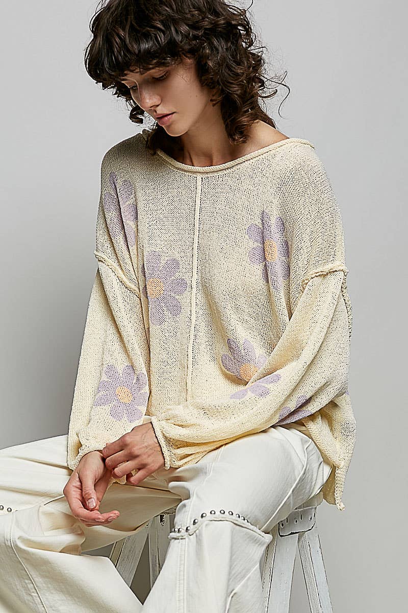 Cream lightweight sweater with lavender floral print, round neckline and balloon sleeves