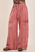 Terracotta J.Her mineral wash wide-leg pants with drawstring waist, front pockets, panel seams, and raw-edge hem.