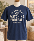 Life is Good men’s I’d Rather Be Watching Football tee in Darkest Blue displayed on a torso mannequin.