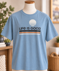 Life is Good men’s slate blue T-shirt featuring a retro sun and striped Life is Good graphic, displayed on a torso mannequin.