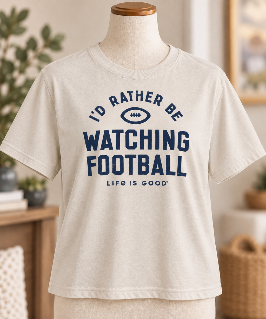 Life is Good women’s I’d Rather Be Watching Football tee in Putty White displayed on a torso mannequin.