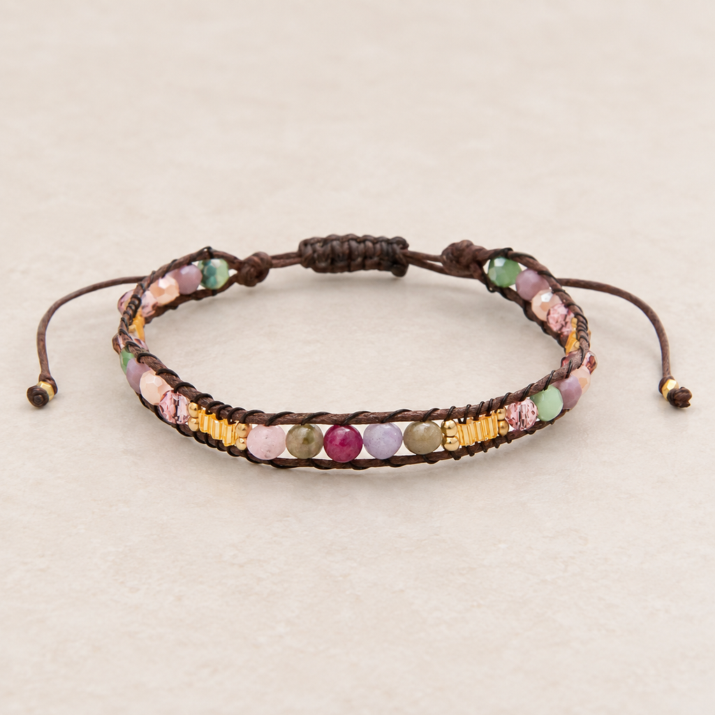 Lotus and Luna Autumn Glow bracelet with multicolor stone beads, gold accents, and brown adjustable cord.