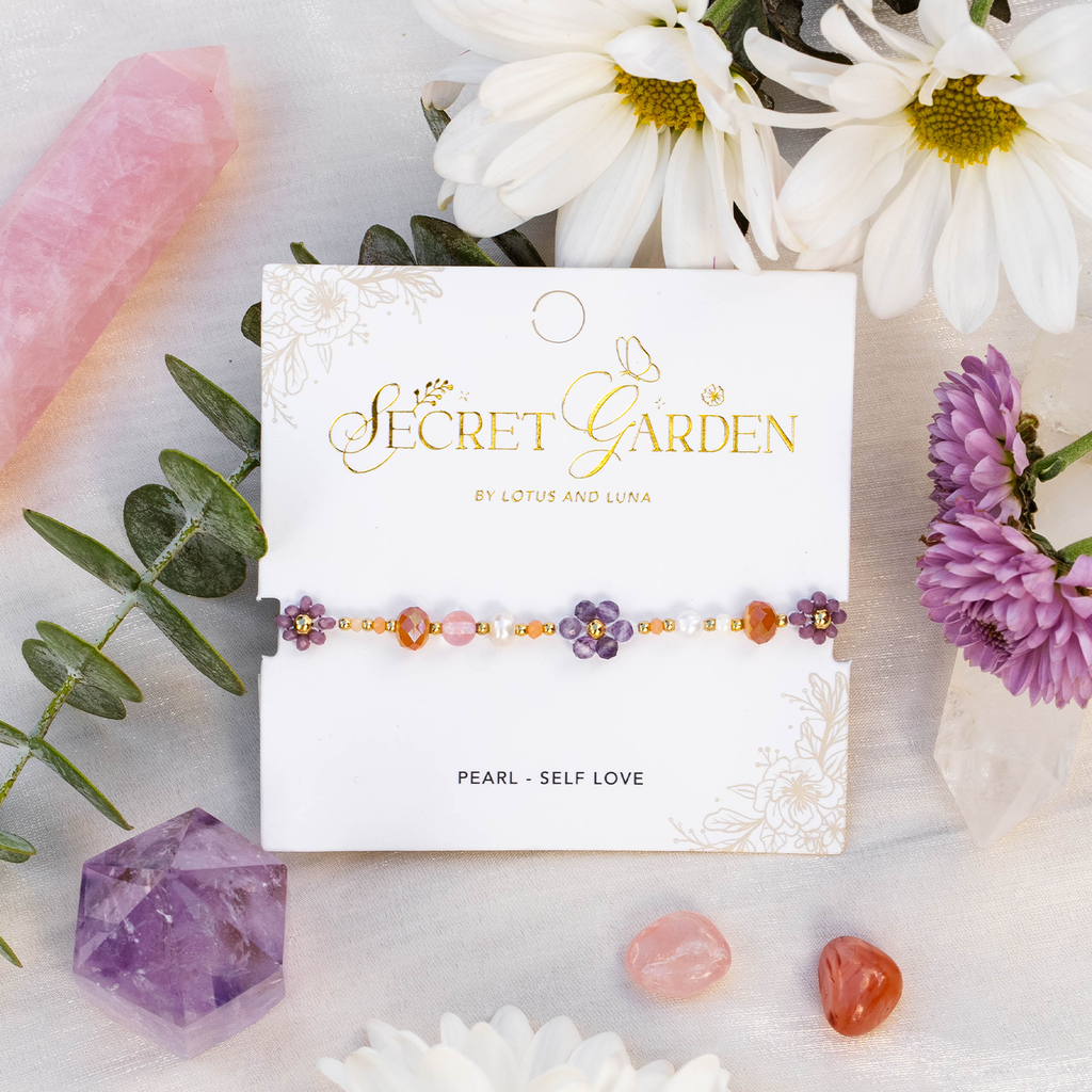 Lotus and Luna Blossoming Beauty Secret Garden bracelet with floral beads and colorful gemstone accents.
