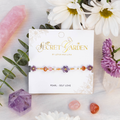 Lotus and Luna Blossoming Beauty Secret Garden bracelet with floral beads and colorful gemstone accents.