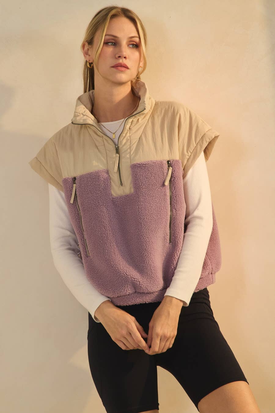 Oddi colorblock sleeveless pullover with lavender sherpa, padded beige upper and half-zip neckline